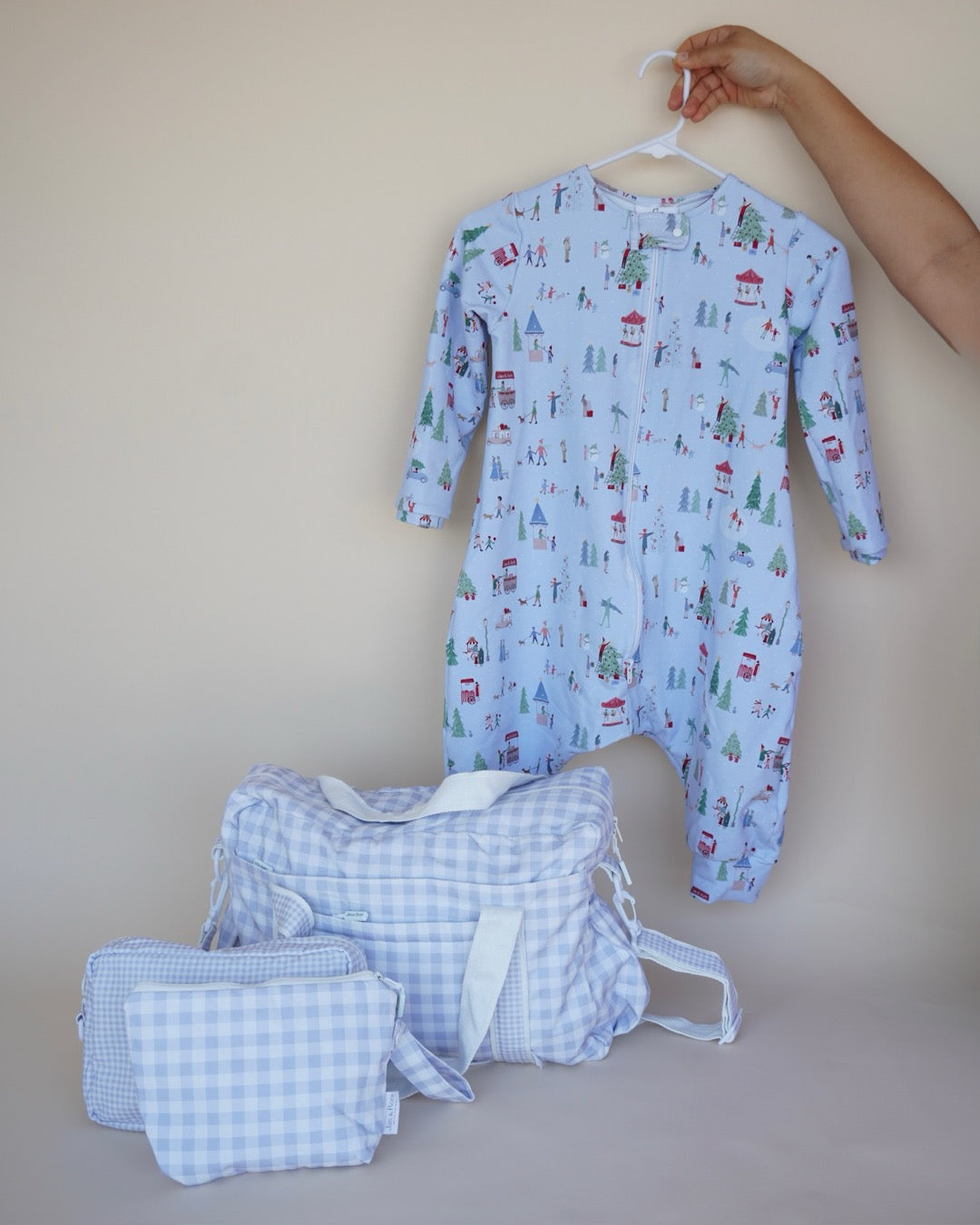 Saquito con pies small Christmas Edition, pañalera, neceser y bolsita colgable.