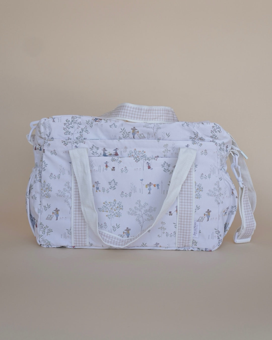 Pañalera de tela estampada de ratones en fondo crema