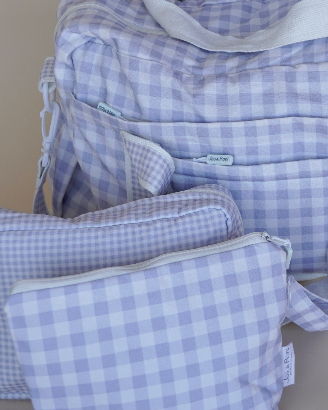 Saquito con pies small Christmas Edition, pañalera, neceser y bolsita colgable.