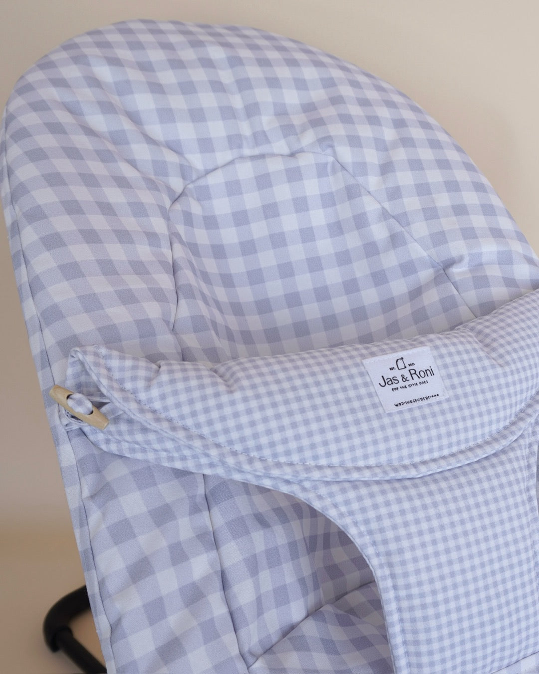 Funda de tela para hamaca a cuadros azules en fondo crema